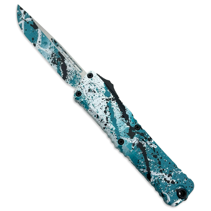 Microtech 1143-1TQWHBKSPLS - Combat Troodon S/E Gen III Signature Series Turquoise/White Black Splatter Standard