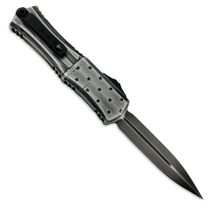 Microtech 1702M-1DKFLAGS - Hera II Mini D/E Signature Series Dark Flag Standard